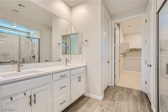 Bath with Dual Sinks, Open Shower with Seat and TOTO Toilet Seats | Image 18