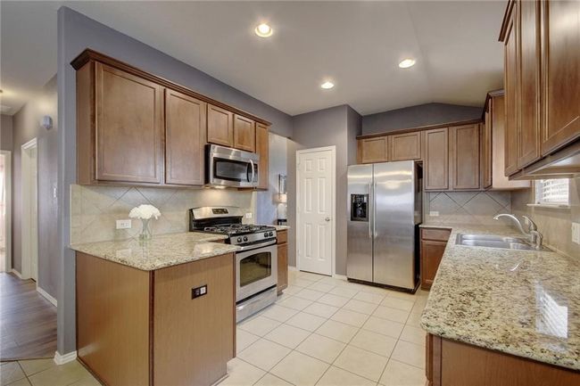 1036 Estival Dr, House other with 3 bedrooms, 2 bathrooms and 4 parking in Kyle TX | Image 9