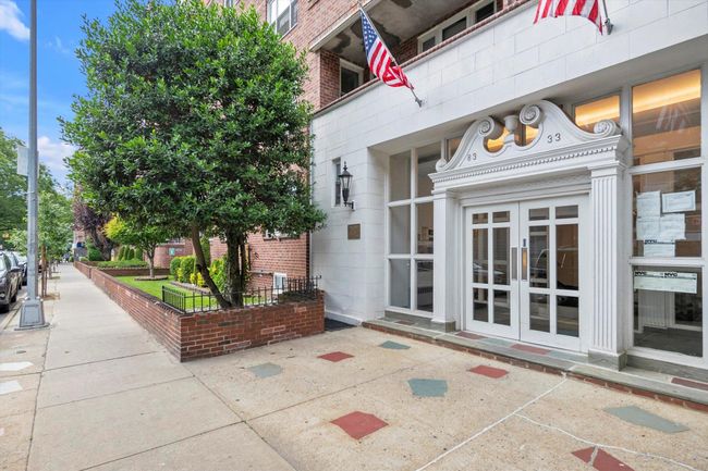 Property entrance with french doors and brick siding | Image 17