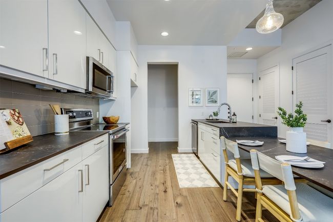 Stainless steel appliances give the kitchen a polished, cohesive look and are built to handle serious daily use | Image 14