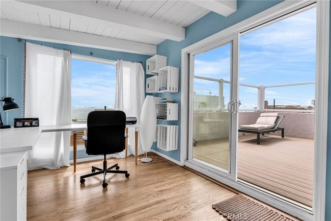 A loft/office off the living room and kitchen provide a great space to enjoy wide open ocean views | Image 17