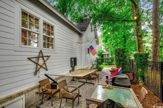 View of patio with outdoor dining space | Image 31