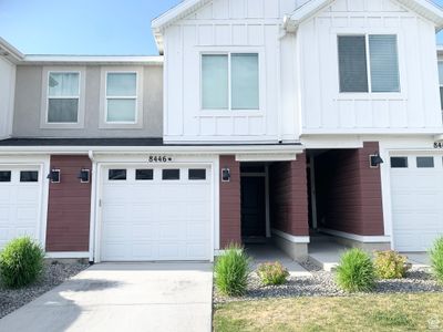 View of front of house featuring a garage | Image 1