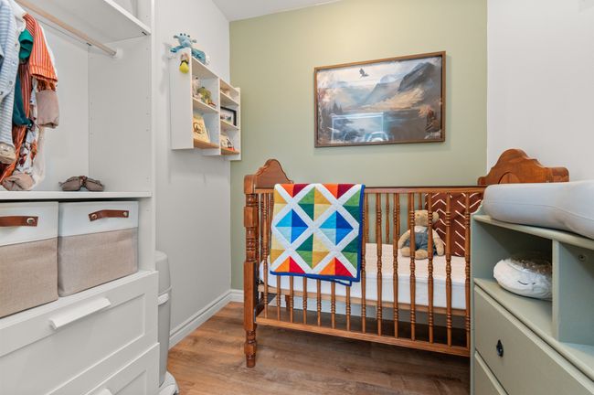 Bedroom featuring wood finished floors | Image 22