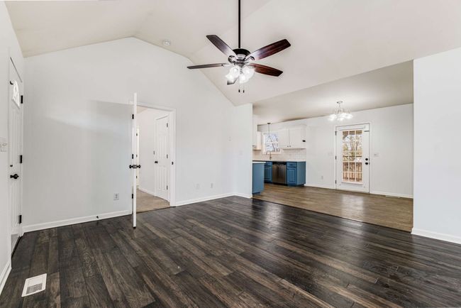 Primary bedroom is off the living room | Image 6