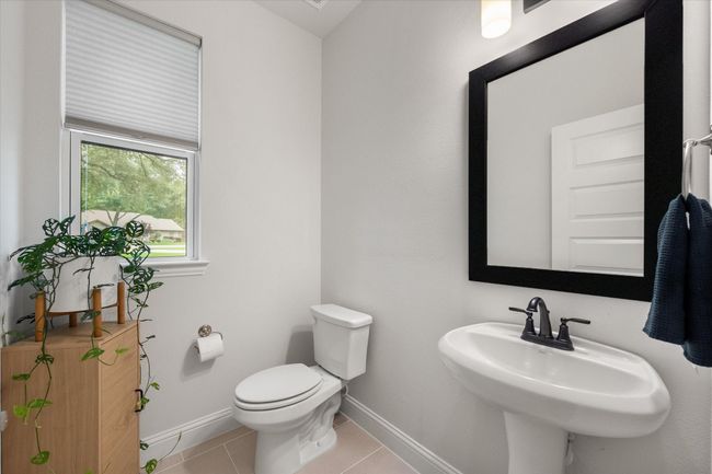 The half-bath is on the first floor for guests. | Image 7