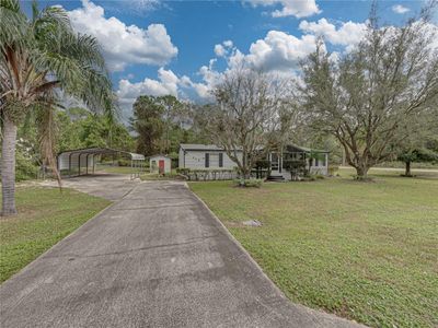 117 E Sunnyside Drive, Home with 3 bedrooms, 2 bathrooms and null parking in Lake Placid FL | Image 2