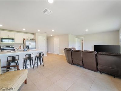 View of tiled living room | Image 3