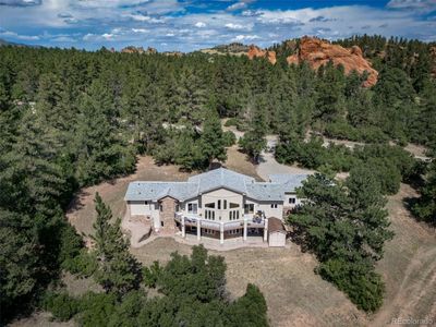 7255 Perry Park Boulevard, House other with 3 bedrooms, 2 bathrooms and 3 parking in Larkspur CO | Image 1