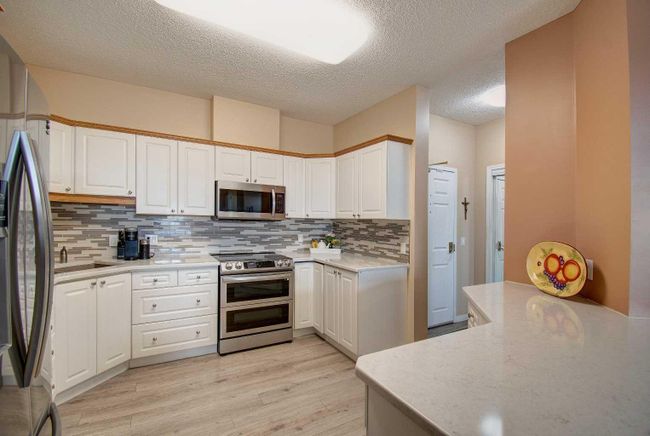 213 - 5201 Dalhousie Drive Nw, Home with 2 bedrooms, 2 bathrooms and 2 parking in Calgary AB | Image 6