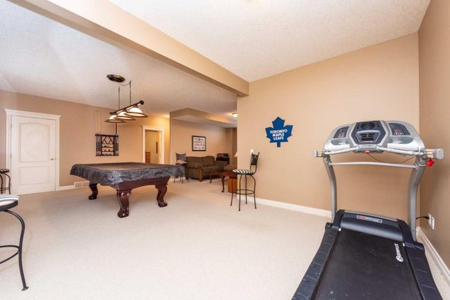 1212 Woodside Way Nw, Home with 4 bedrooms, 2 bathrooms and 4 parking in Airdrie AB | Image 40