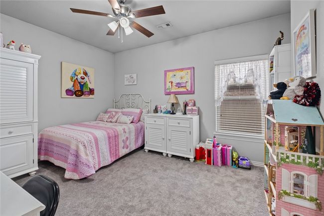 Bedroom 3 is behind the kitchen with bedroom 4. New carpet in 2022. They share a Jack and Jill bathroom. | Image 26