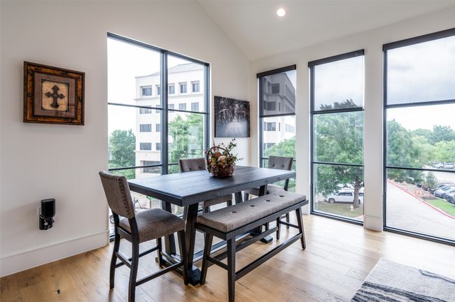 Cozy dining room with gorgeous view from both corners | Image 8