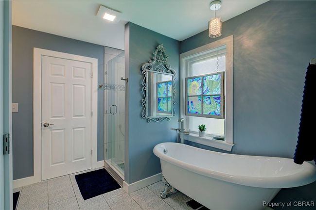 Bathroom featuring tile patterned floors and separate shower and tub | Image 43