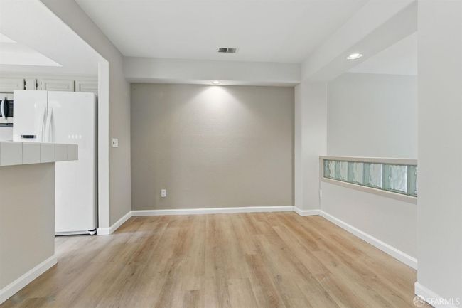 Family room open to living room below and overlooks the kitchen and dining room | Image 12