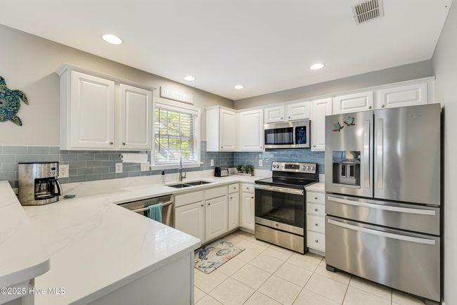 107 Ne 24 Th St, House other with 3 bedrooms, 2 bathrooms and null parking in Oak Island NC | Image 17