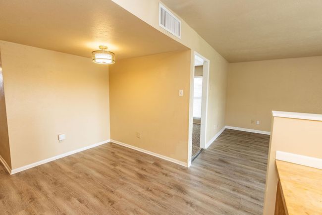 Unfurnished room featuring hardwood / wood-style flooring | Image 9