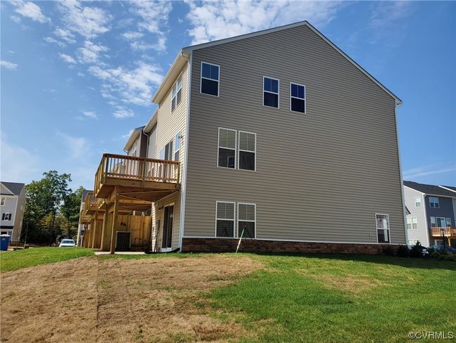 Rear view of property with central AC | Image 32