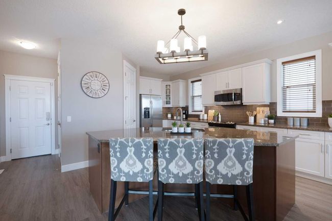 64 Windgate Close Sw, House other with 4 bedrooms, 3 bathrooms and 4 parking in Airdrie AB | Image 7