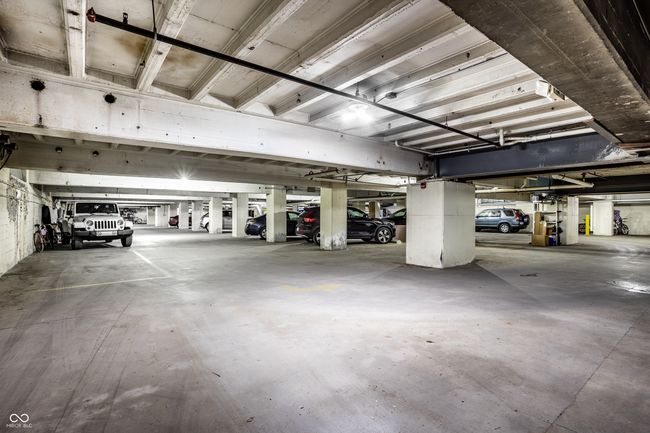 parking deck featuring a garage door opener | Image 31