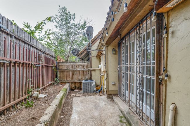Fenced backyard featuring a patio area | Image 23