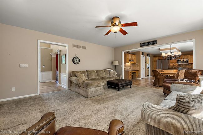 Living room leading into the Kitchen | Image 13
