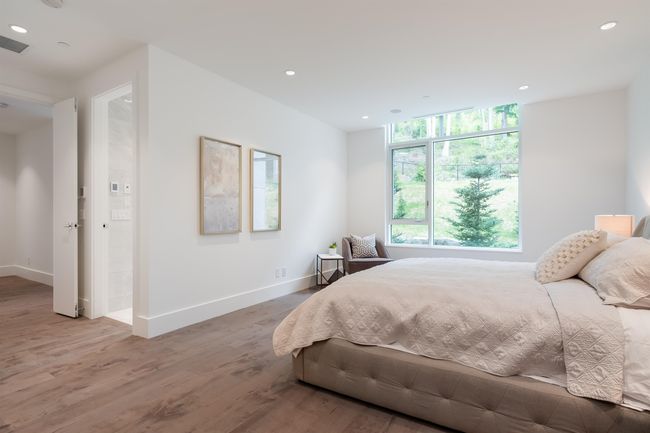 Bedroom featuring wood finished floors and recessed lighting | Image 21