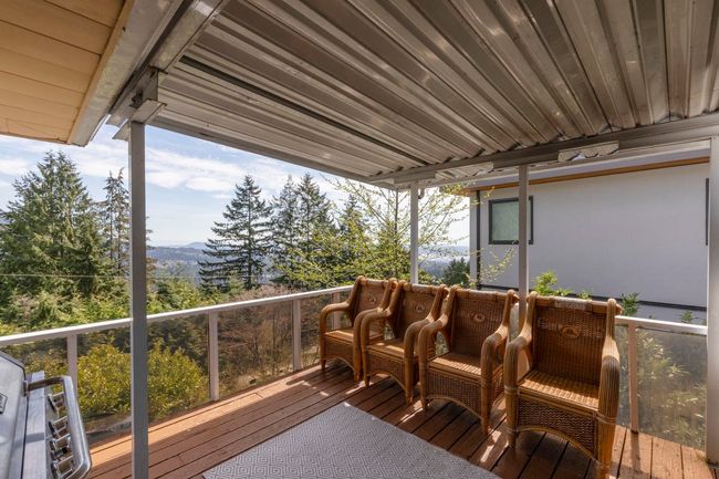 Wooden terrace featuring a mountain view | Image 19