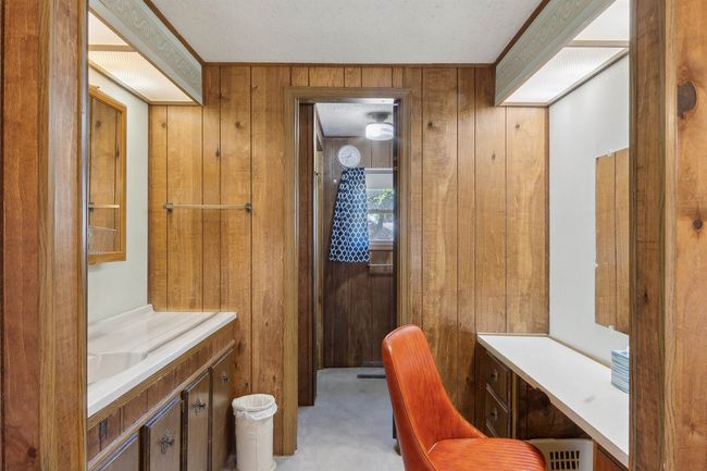 Sink with vanity and make up vanity, shower | Image 16