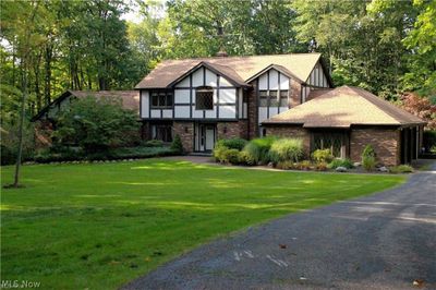 Tudor house featuring a front yard | Image 1