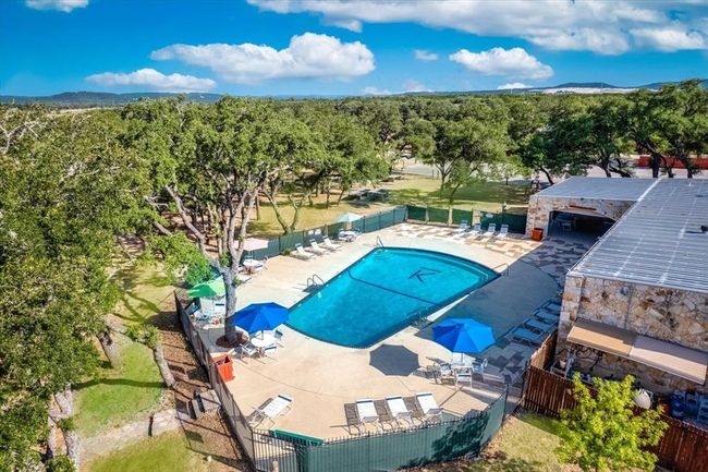 Community pool featuring a patio | Image 16
