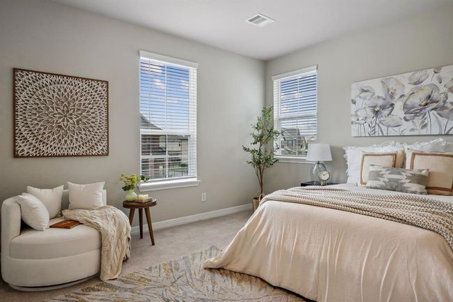 Luxurious primary bedroom. | Image 11