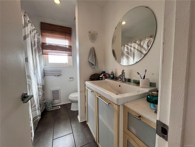 Bathroom with vanity and tile flooring | Image 8