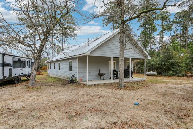 View of back facade featuring a patio | Image 35