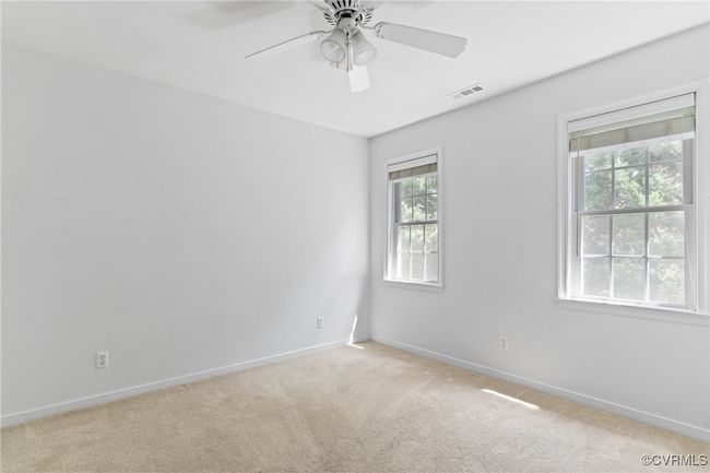 Empty room featuring carpet flooring and a ceiling fan | Image 22