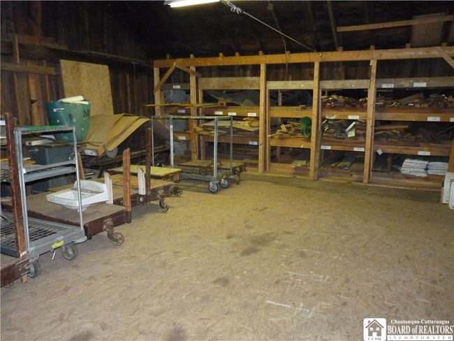Rear storage area with shelving | Image 10