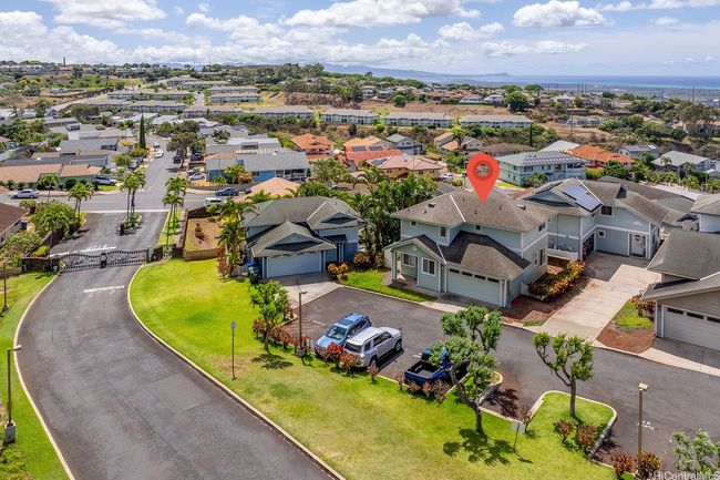 The home’s location in the hills of Makakilo allows for cool mountain air. Notice Diamond Head in the distance. | Image 23