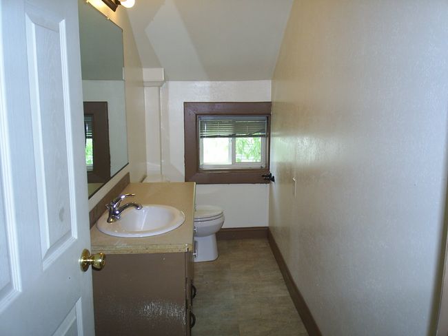 Unit 1 upstairs half bathroom | Image 19