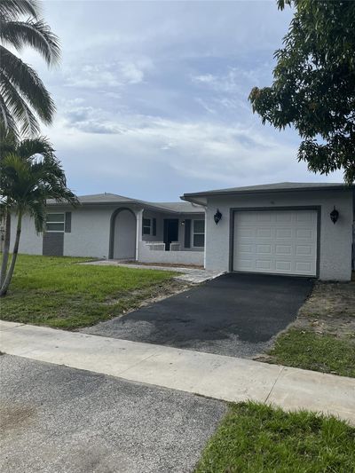 7771 Nw 46th St, House other with 4 bedrooms, 2 bathrooms and null parking in Lauderhill FL | Image 1