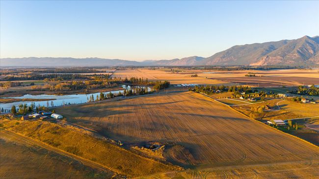 Birds eye view of property featuring a rural view and a water and mountain view | Image 65