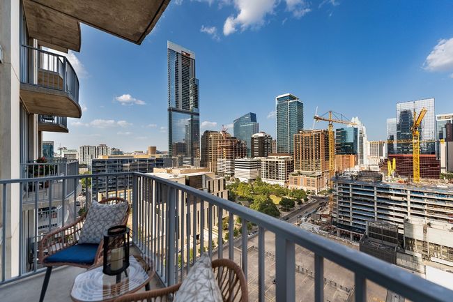 Balcony with a skyline view | Image 23