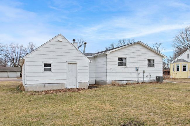 A view of the home's rear exterior. | Image 17