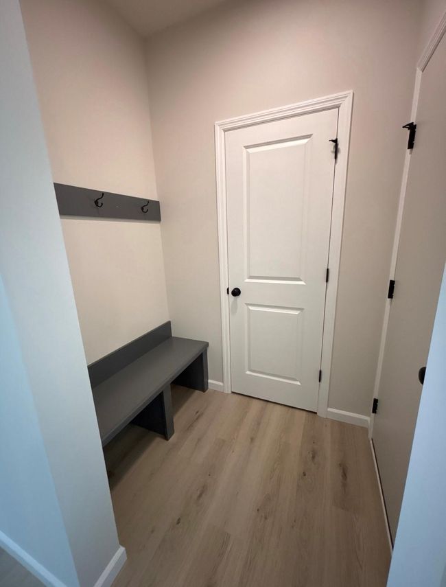 Mudroom with spacious closet and bench! | Image 8