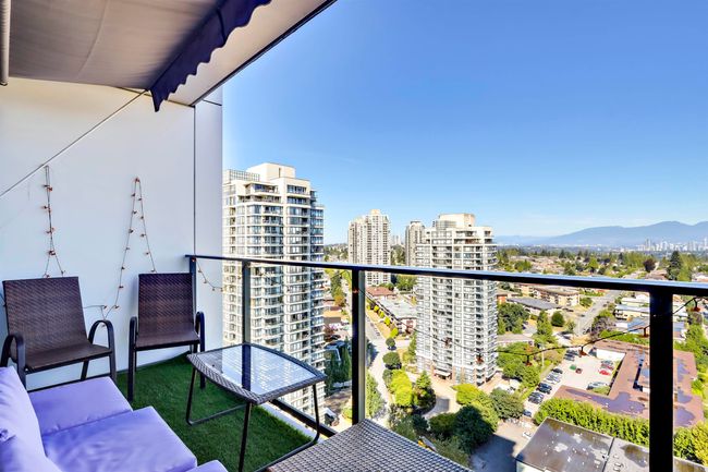 Balcony featuring a city view and a mountain view | Image 15
