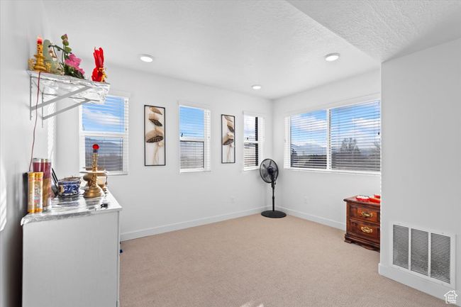 Interior space with baseboards, visible vents, and recessed lighting | Image 9