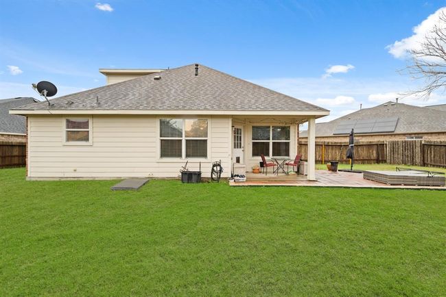 Step into the backyard oasis, with alarge covered patio, creating aninviting outdoor retreat. | Image 23