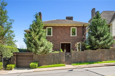 From Centre Ave, gated entry. This was the back of the house, today used with front gate. | Image 2