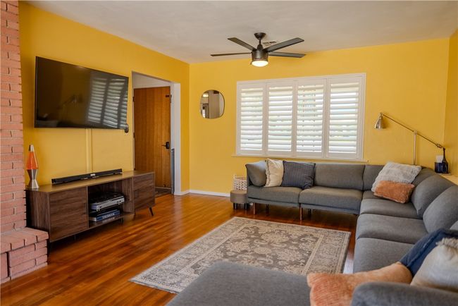 Living areas facing entry way into home | Image 8