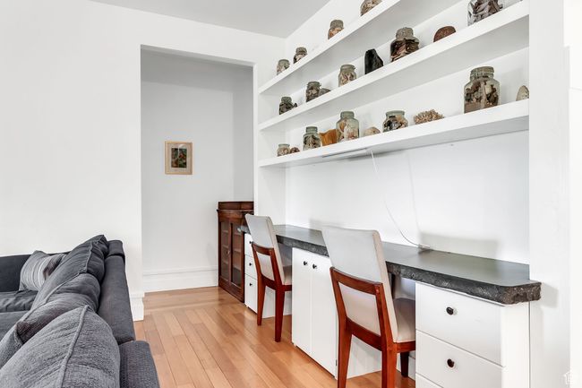 Built in shelves and desks in main level living room | Image 20
