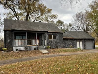 New Sidewalks and Porch Steps with Inviting Swing | Image 3